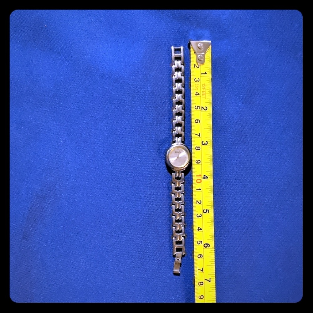 Women's Guess watch 6" length -silver